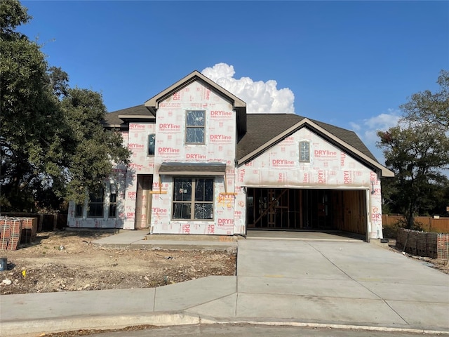 property in mid-construction featuring a garage