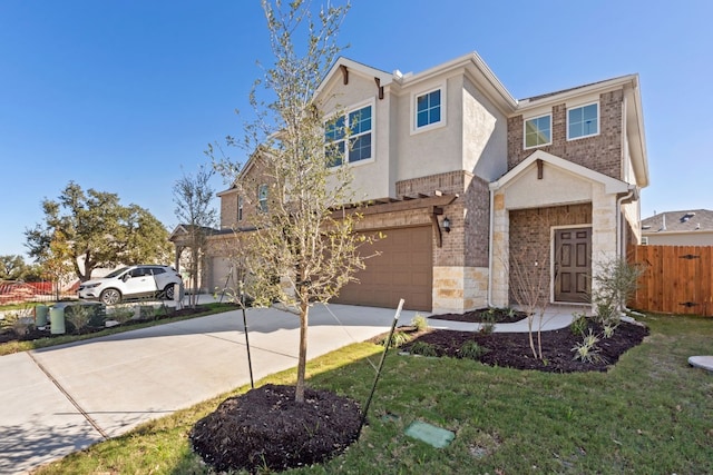 view of front of house featuring a front lawn and a garage