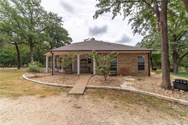 2600 Fm 2095, Cameron, TX 76520 - back of property with a porch and brick siding