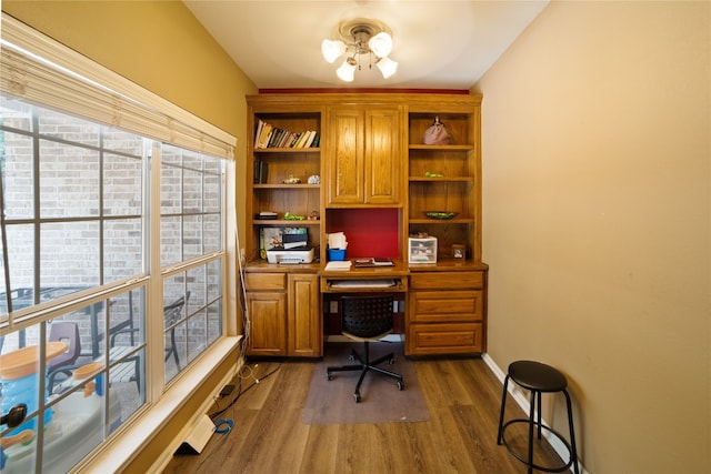 office space featuring ceiling fan and light wood-type flooring