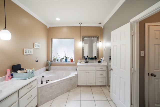 bathroom featuring tile patterned floors, a tub, vanity, and crown molding