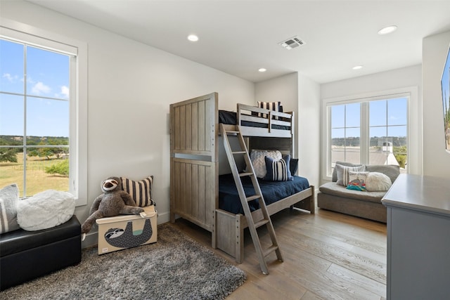 bedroom with light hardwood / wood-style flooring