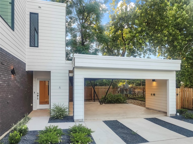 view of front of home with a carport