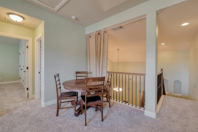 view of carpeted dining space