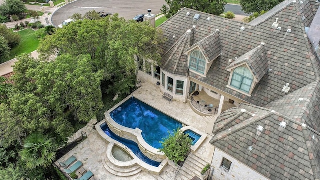 pool featuring a patio area