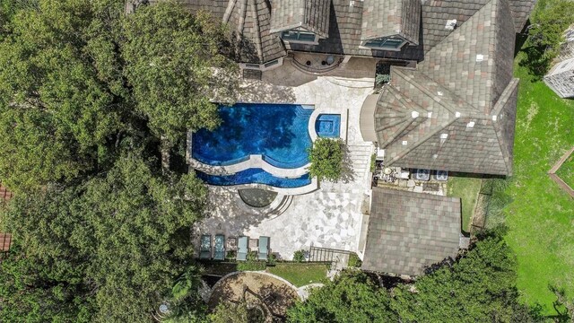 2413 Never Bend Cv, Austin, TX 78746 - view of subject property featuring a pool