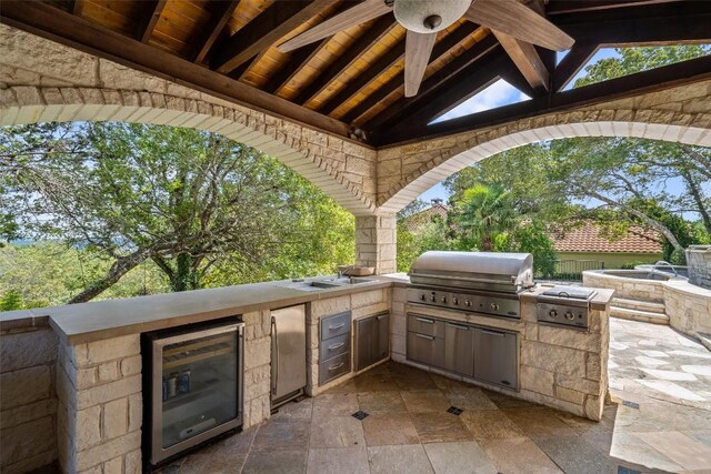 2413 Never Bend Cv, Austin, TX 78746 - view of patio featuring wine cooler