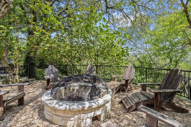 view of patio / terrace with an outdoor fire pit