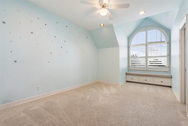 2413 Never Bend Cv, Austin, TX 78746 - bonus room with light colored carpet, vaulted ceiling, baseboards, and ceiling fan