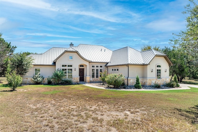 view of front of home with a front yard