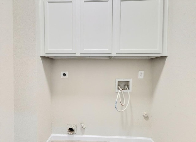 laundry room featuring washer hookup, cabinet space, gas dryer hookup, and electric dryer hookup