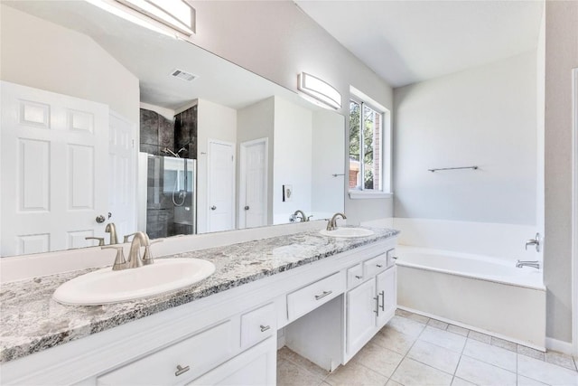 bathroom featuring a stall shower, visible vents, a sink, and a bath