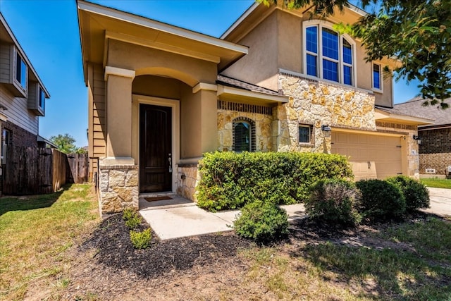 view of front facade with a front lawn and a garage