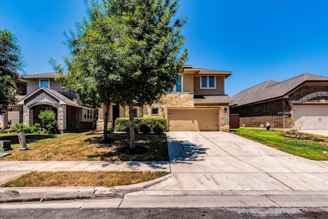 view of front of home with stone siding, driveway, an attached garage, and stucco siding