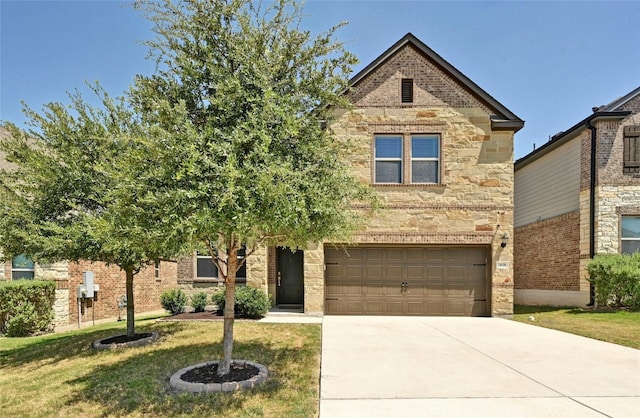 view of front of home with a garage and a front yard