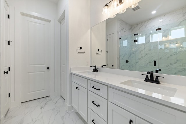 bathroom with vanity and an enclosed shower