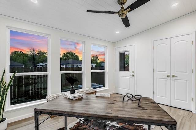 office area featuring ceiling fan, wood-type flooring, and wooden ceiling