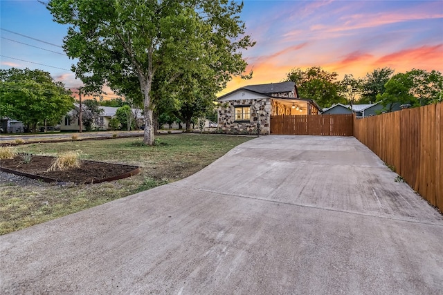 patio terrace at dusk with a lawn