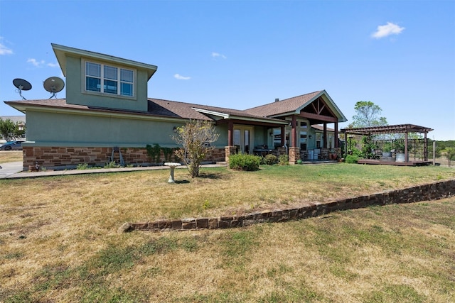 rear view of house featuring a lawn and a patio area