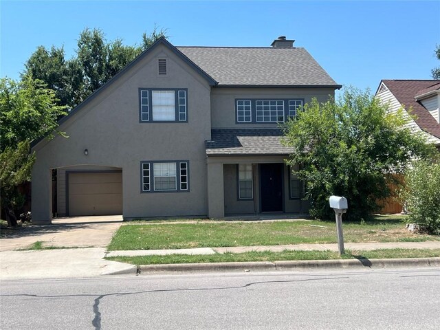 view of front facade featuring a front yard