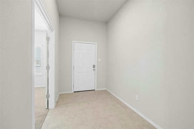 interior space with light tile patterned floors