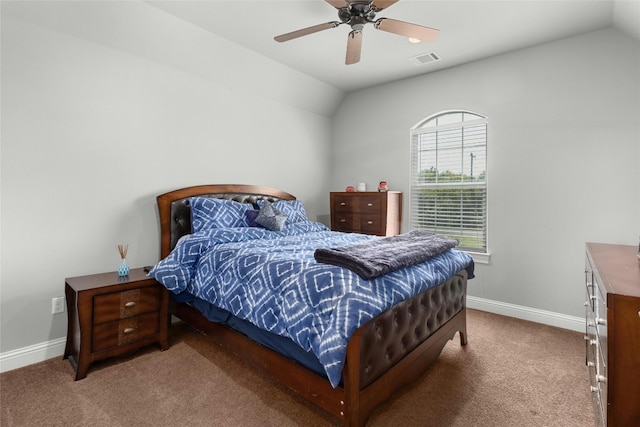 carpeted bedroom featuring ceiling fan and vaulted ceiling