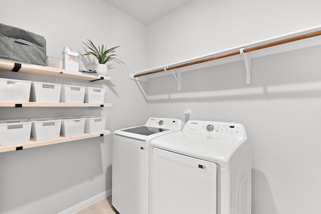 laundry area featuring independent washer and dryer