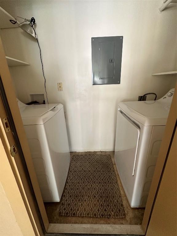 laundry area featuring laundry area, independent washer and dryer, and electric panel