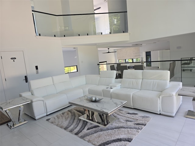 living room featuring a high ceiling