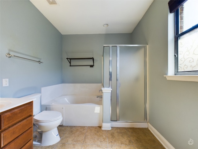 full bathroom with tile patterned flooring, vanity, independent shower and bath, and toilet