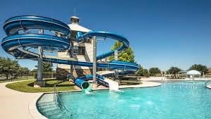 view of pool featuring a water slide