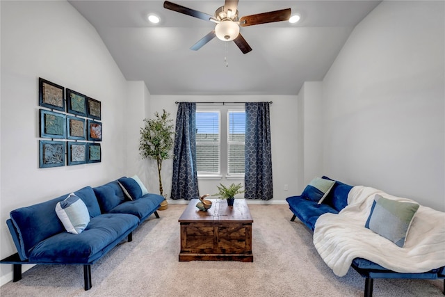 121 Woods Edge Ln, Georgetown, TX 78628 - carpeted living room with vaulted ceiling, ceiling fan, and baseboards