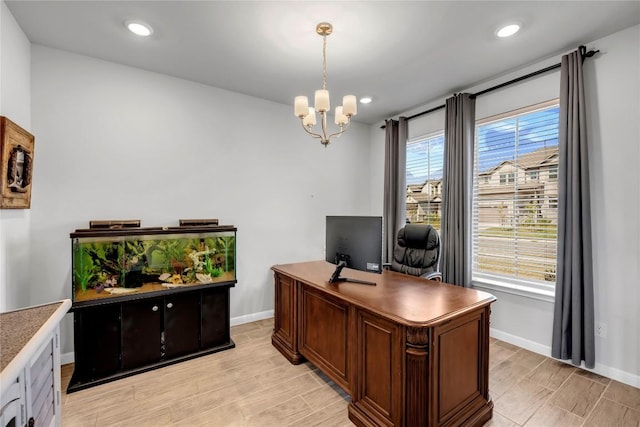 121 Woods Edge Ln, Georgetown, TX 78628 - office featuring light wood finished floors, a chandelier, and recessed lighting