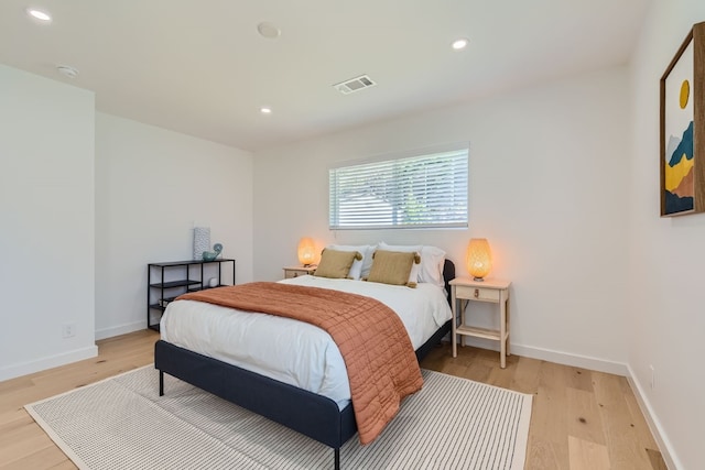 bedroom featuring light hardwood / wood-style floors