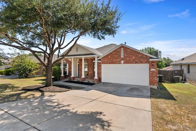 view of front of home featuring a front lawn and a garage