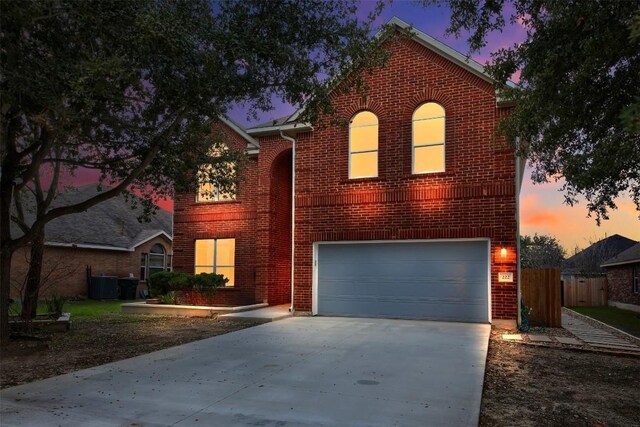 front of property with a garage