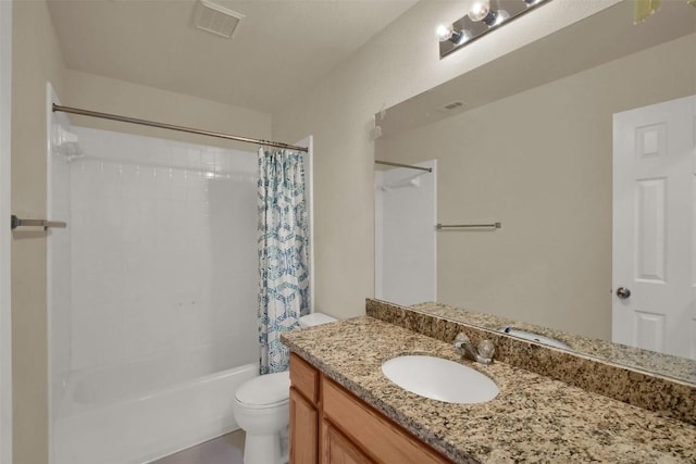 bathroom with visible vents, shower / tub combo with curtain, vanity, and toilet