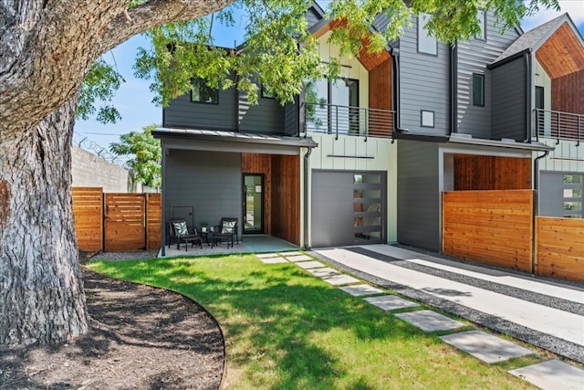 back of house with a patio