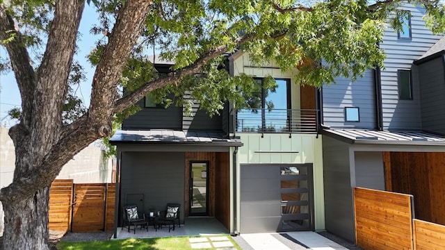 rear view of property featuring a patio area