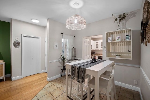 dining room with light hardwood / wood-style flooring