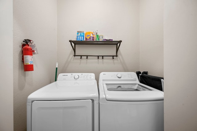 laundry room featuring independent washer and dryer