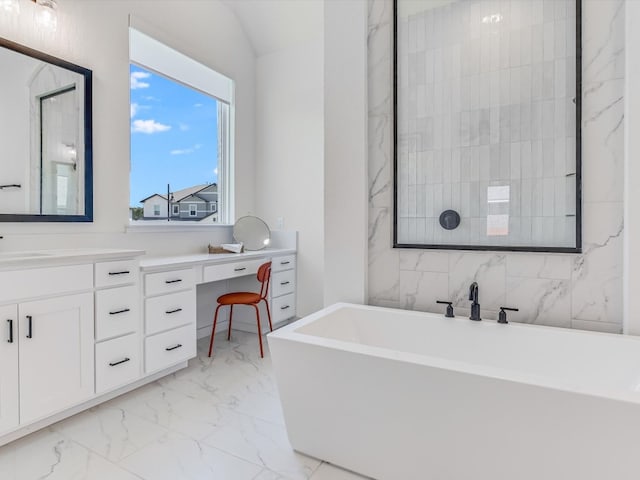 bathroom featuring a bathtub and vanity