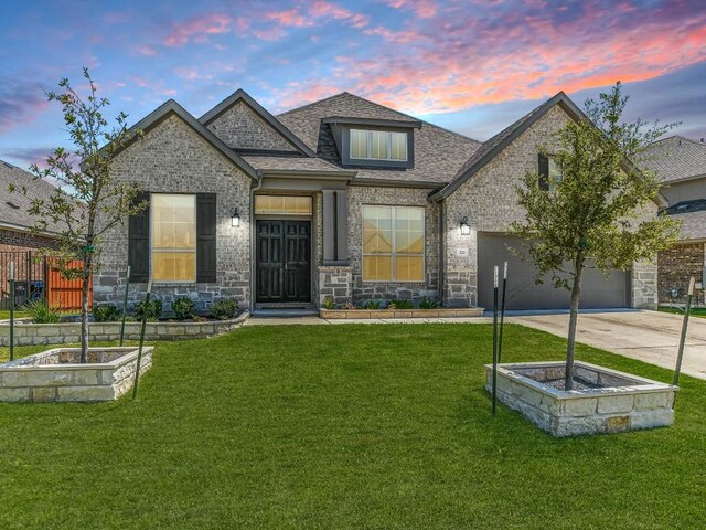 craftsman inspired home featuring a yard