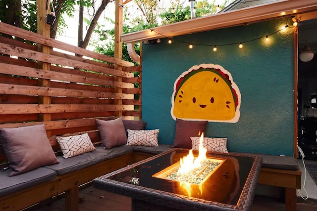 view of patio featuring an outdoor fire pit