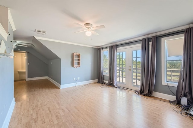 interior space with ceiling fan, light hardwood / wood-style flooring, and french doors