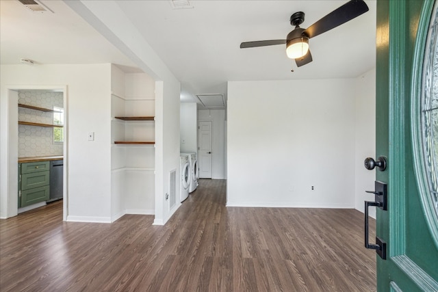 unfurnished room featuring hardwood / wood-style floors, independent washer and dryer, and ceiling fan