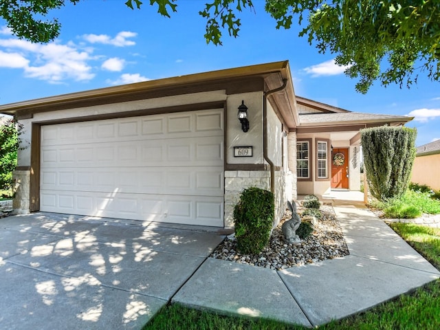 ranch-style home with a garage