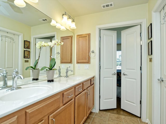 bathroom featuring vanity and tile patterned flooring