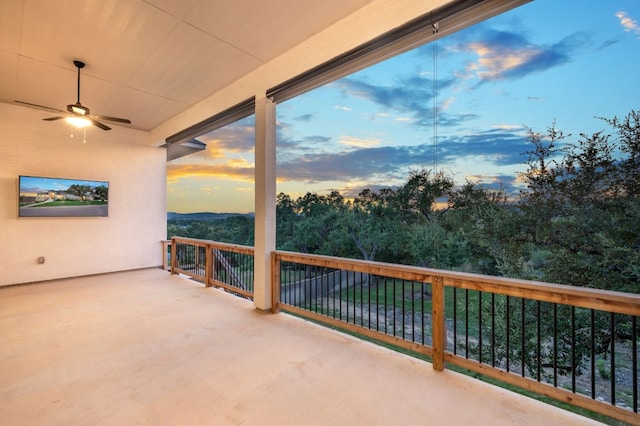 patio terrace at dusk with ceiling fan