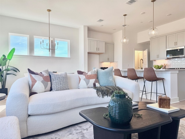 living room with light hardwood / wood-style flooring